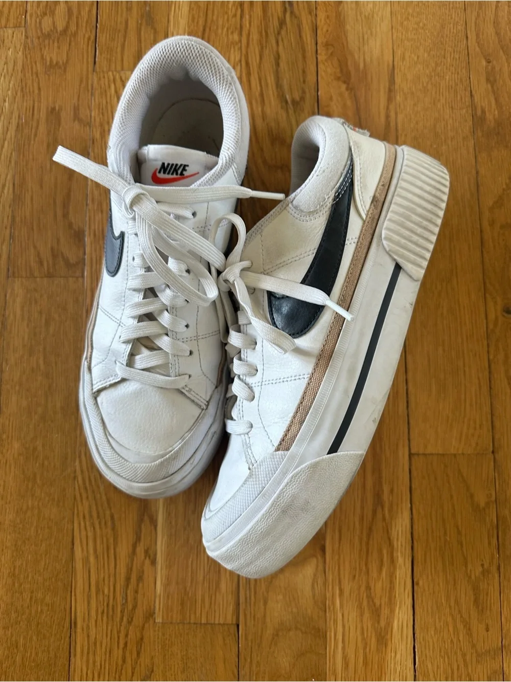 Nike Men’s White Sneakers with Black Swoosh